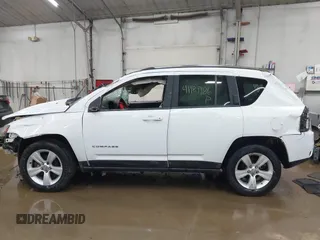 2014 Jeep Compass Sport with VIN 1C4NJDBB3ED773960, listed as a IAAI auction lot 41989986 with 126,875 mi miles. Bid and sale history available at carsss.com. Image 14.