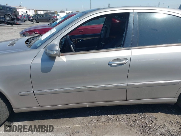 2006 Mercedes-Benz E-Class 3.5L with VIN WDBUF56J96A838185, listed as a IAAI auction lot 41981543 with 213,431 mi miles. Bid and sale history available at carsss.com. Image 6.