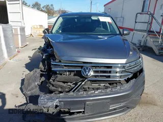 2022 Volkswagen Tiguan S with VIN 3VV1B7AX9NM055507, listed as a IAAI auction lot 41383597 with 25,546 mi miles and . Bid and sale history available at DreamBid. Image 13.