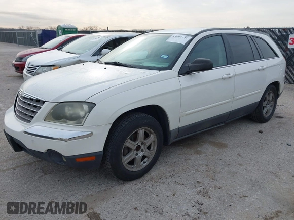 2005 Chrysler Pacifica Touring with VIN 2C8GF68465R653743, listed as a IAAI auction lot 41697747 with 250,645 mi miles and . Bid and sale history available at DreamBid. Image 2.