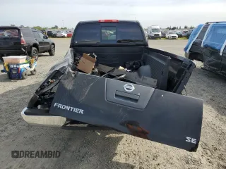 2009 Nissan Frontier SE with VIN 1N6BD06T09C409087, listed as a Copart auction lot 52325915 with 190,970 mi miles and Salvage title. Bid and sale history available at DreamBid. Image 6.