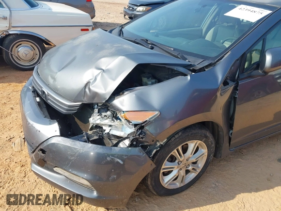 2010 Honda Insight EX with VIN JHMZE2H74AS027020, listed as a IAAI auction lot 42394875 with 248,003 mi miles and . Bid and sale history available at DreamBid. Image 6.