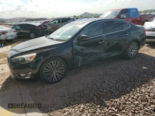 2014 Kia Cadenza Premium z VIN KNALN4D77E5133228, wystawiony jako Copart lot #51340065 z przebiegiem 195 454 mil mil oraz Szkody całkowita. Historia ofert i sprzedaży dostępna na DreamBid. Obrazek 1.
