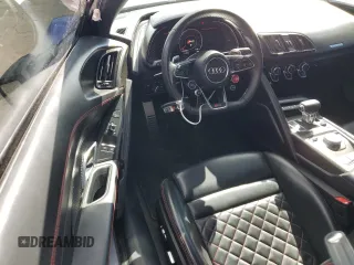 2017 Audi R8 z VIN WUAKBAFX2H7903141, wystawiony jako Copart lot #46552054 z przebiegiem 20 096 mil mil oraz . Historia ofert i sprzedaży dostępna na DreamBid. Obrazek 8.