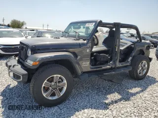 2020 Jeep Wrangler Unlimited Sahara with VIN 1C4HJXEN7LW204373, listed as a Copart auction lot 52633185 with 71,324 mi miles and Salvage title. Bid and sale history available at DreamBid. Image 1.