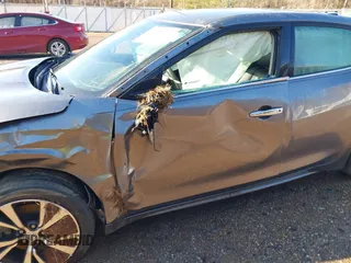 2016 Nissan Maxima SV z VIN 1N4AA6APXGC386974, wystawiony jako IAAI lot #41738932 z przebiegiem 132 395 mil mil oraz . Historia ofert i sprzedaży dostępna na DreamBid. Obrazek 20.