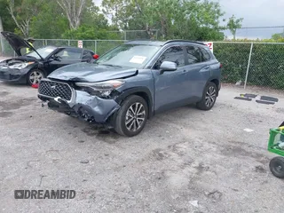 2023 Toyota Corolla Cross XLE with VIN 7MUDAAAGXPV070263, listed as a IAAI auction lot 42394307 with 18,977 mi miles and . Bid and sale history available at DreamBid. Image 18.