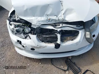 2011 BMW 3 Series 335i with VIN WBAKG7C56BE598702, listed as a IAAI auction lot 42159394 with Not provided miles and . Bid and sale history available at DreamBid. Image 6.