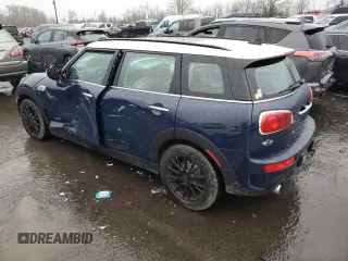2018 MINI Clubman Cooper S with VIN WMWLU5C5XJ2G02447, listed as a Copart auction lot 85390874 with 115,354 mi miles and Salvage Title. Bid and sale history available at carsss.com. Image 2.