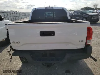 2016 Toyota Tacoma SR with VIN 5TFCZ5AN7GX010875, listed as a Copart auction lot 52496485 with 96,409 mi miles and Salvage Title. Bid and sale history available at carsss.com. Image 6.