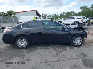2010 Nissan Altima 2.5 S with VIN 1N4AL2AP9AC173959, listed as a IAAI auction lot 42010669 with 154,357 mi miles. Bid and sale history available at carsss.com. Image 13.