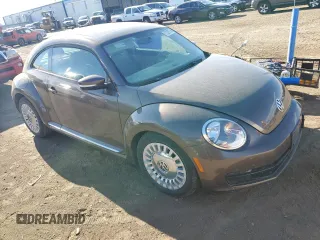 2015 Volkswagen Beetle with VIN 3VWH17AT3FM604193, listed as a Copart auction lot 72023304 with 49,958 mi miles and Salvage Title. Bid and sale history available at DreamBid. Image 4.