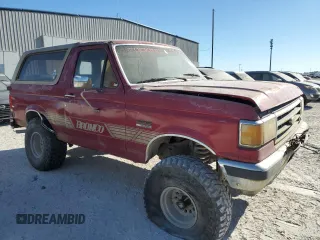 1990 Ford Bronco Custom with VIN 1FMEU15HXLLB16478, listed as a Copart auction lot 82661804 with 188,692 mi miles and Clean Title. Bid and sale history available at carsss.com. Image 4.