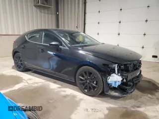 2024 Mazda 3 S Select Sport with VIN JM1BPAKMXR1718852, listed as a Copart auction lot 61240255 with 6,748 mi miles and Salvage title. Bid and sale history available at DreamBid. Image 4.