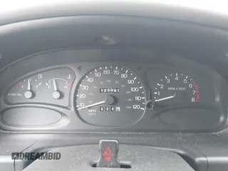 1997 Ford Escort LX with VIN 1FALP13P2VW392173, listed as a IAAI auction lot 41833271 with 123,991 mi miles. Bid and sale history available at carsss.com. Image 7.
