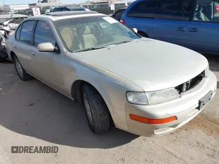 1998 Nissan Maxima GXE z VIN JN1CA21D5WM906429, wystawiony jako IAAI lot #41642660 z przebiegiem 320 327 mil mil oraz . Historia ofert i sprzedaży dostępna na DreamBid. Obrazek 1.