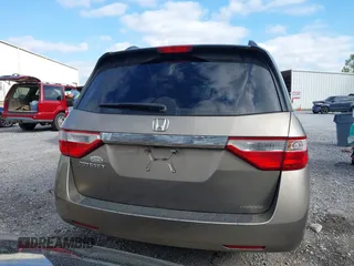 2013 Honda Odyssey EX z VIN 5FNRL5H40DB038886, wystawiony jako IAAI lot #41761738 z przebiegiem 244 107 mil mil oraz . Historia ofert i sprzedaży dostępna na DreamBid. Obrazek 16.