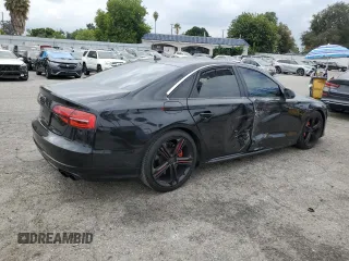 2015 Audi S8 with VIN WAUK2AFD6FN005005, listed as a Copart auction lot 72074884 with 74,335 mi miles and Salvage Title. Bid and sale history available at carsss.com. Image 3.
