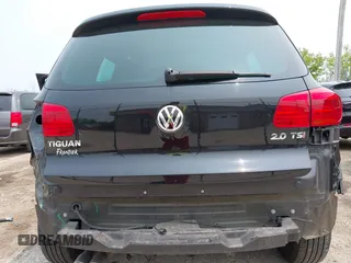 2013 Volkswagen Tiguan S with VIN WVGAV3AX2DW594334, listed as a IAAI auction lot 42405989 with 96,559 mi miles and . Bid and sale history available at DreamBid. Image 6.