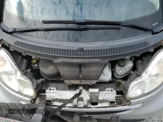 2014 Smart fortwo Pure с VIN WMEEJ3BA7EK761731, выставлен на аукционе Copart как лот 60268205 с пробегом 61 973 миль миль и Списание • Salvage title. История ставок и продаж доступна на DreamBid. Изображение 11.