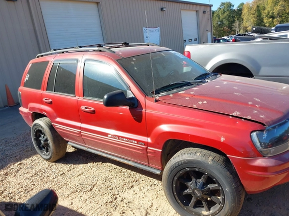 2004 Jeep Grand Cherokee Limited with VIN 1J4GW58N34C124515, listed as a IAAI auction lot 40602071 with 169,358 mi miles. Bid and sale history available at carsss.com. Image 13.