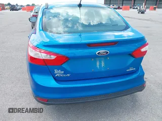 2014 Ford Focus SE z VIN 1FADP3F20EL452324, wystawiony jako IAAI lot #40097434 z przebiegiem 131 789 mil mil oraz . Historia ofert i sprzedaży dostępna na DreamBid. Obrazek 12.