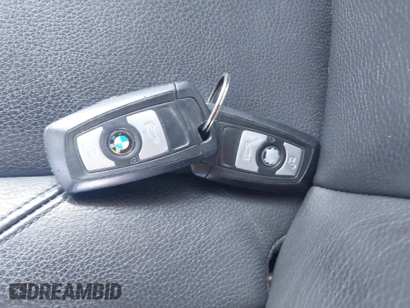 2013 BMW 3 Series 328i with VIN WBA3C1G52DNR44660, listed as a IAAI auction lot 41994277 with 165,151 mi miles and . Bid and sale history available at carsss.com. Image 11.