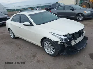 2014 Cadillac CTS Luxury AWD with VIN 1G6AX5S37E0143025, listed as a IAAI auction lot 42507478 with 101,982 mi miles and . Bid and sale history available at DreamBid. Image 1.
