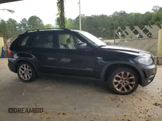 2012 BMW X5 35i with VIN 5UXZV4C54CL990112, listed as a Copart auction lot 59125245 with 142,742 mi miles and Clean title. Bid and sale history available at DreamBid. Image 4.