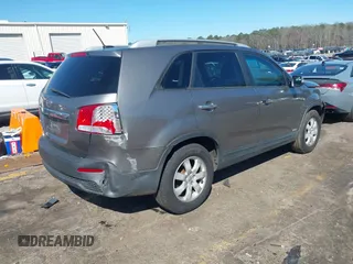 2012 Kia Sorento LX with VIN 5XYKTDA25CG235127, listed as a IAAI auction lot 41804019 with 176,000 mi miles. Bid and sale history available at carsss.com. Image 4.