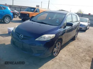 2010 Mazda 5 Sport with VIN JM1CR2W34A0380817, listed as a IAAI auction lot 42047595 with 189,592 mi miles. Bid and sale history available at carsss.com. Image 2.