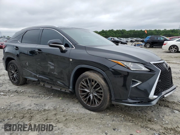 2016 Lexus RX 350 with VIN 2T2BZMCA9GC039515, listed as a Copart auction lot 58614395 with 144,614 mi miles and Salvage title. Bid and sale history available at DreamBid. Image 4.