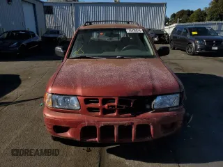 2001 Isuzu Rodeo S with VIN 4S2CK58W014302125, listed as a Copart auction lot 76425614 with 204,350 mi miles and Salvage title. Bid and sale history available at DreamBid. Image 5.