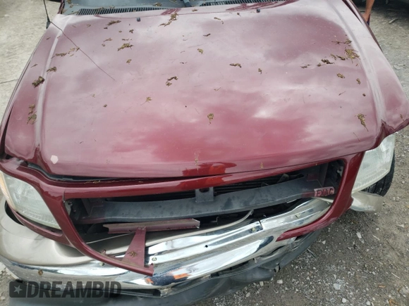 2003 Ford F-150 XL with VIN 1FTRX07L73KC07352, listed as a Copart auction lot 64639214 with 108,003 mi miles and Salvage title. Bid and sale history available at DreamBid. Image 11.