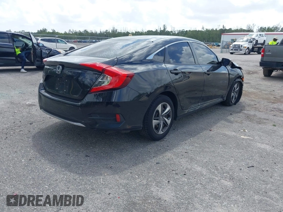 2020 Honda Civic LX z VIN 2HGFC2F61LH600469, wystawiony jako IAAI lot #41958201 z przebiegiem 66 249 mil mil oraz . Historia ofert i sprzedaży dostępna na DreamBid. Obrazek 4.