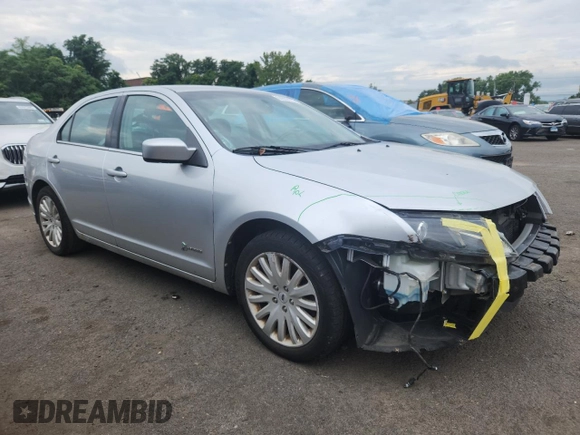 2012 Ford Fusion Hybrid z VIN 3FADP0L34CR227740, wystawiony jako Copart lot #64989475 z przebiegiem 134 862 mil mil oraz Szkoda całkowita • Salvage title. Historia ofert i sprzedaży dostępna na DreamBid. Obrazek 4.