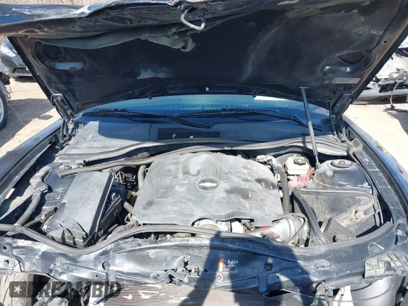 2014 Chevrolet Camaro LS z VIN 2G1FA1E36E9246671, wystawiony jako IAAI lot #41770553 z przebiegiem 170 121 mil mil oraz . Historia ofert i sprzedaży dostępna na DreamBid. Obrazek 10.