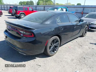 2018 Dodge Charger SXT with VIN 2C3CDXBG8JH134938, listed as a IAAI auction lot 42021136 with 127,596 mi miles and . Bid and sale history available at DreamBid. Image 4.