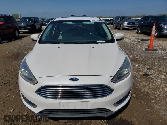 2018 Ford Focus Titanium with VIN 1FADP3J21JL294061, listed as a Copart auction lot 53827375 with 194,577 mi miles and Salvage title. Bid and sale history available at DreamBid. Image 5.