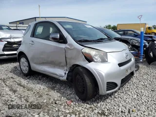 2012 Scion iQ with VIN JTNJJXB03CJ015321, listed as a Copart auction lot 54332355 with 63,439 mi miles and Salvage title. Bid and sale history available at DreamBid. Image 4.