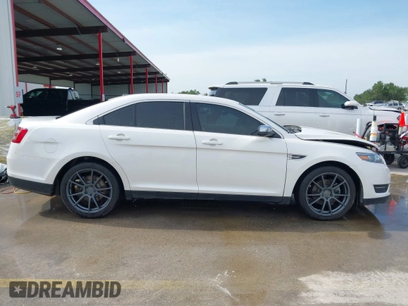 2015 Ford Taurus Limited z VIN 1FAHP2F83FG182936, wystawiony jako IAAI lot #42255917 z przebiegiem 138 966 mil mil oraz . Historia ofert i sprzedaży dostępna na DreamBid. Obrazek 14.