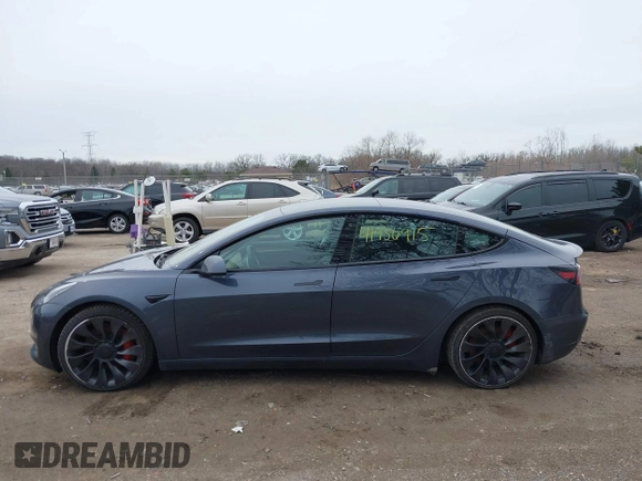 2023 Tesla Model 3 Performance with VIN 5YJ3E1EC9PF407365, listed as a IAAI auction lot 41956915 with 31,087 mi miles. Bid and sale history available at carsss.com. Image 14.