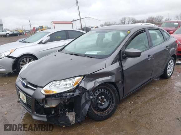 2012 Ford Focus SE with VIN 1FAHP3F26CL220986, listed as a IAAI auction lot 41719127 with 127,050 mi miles and . Bid and sale history available at DreamBid. Image 6.