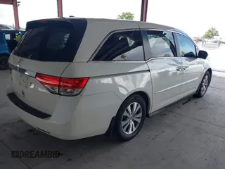 2015 Honda Odyssey EX-L with VIN 5FNRL5H64FB084175, listed as a IAAI auction lot 41943540 with 67,902 mi miles and . Bid and sale history available at carsss.com. Image 4.