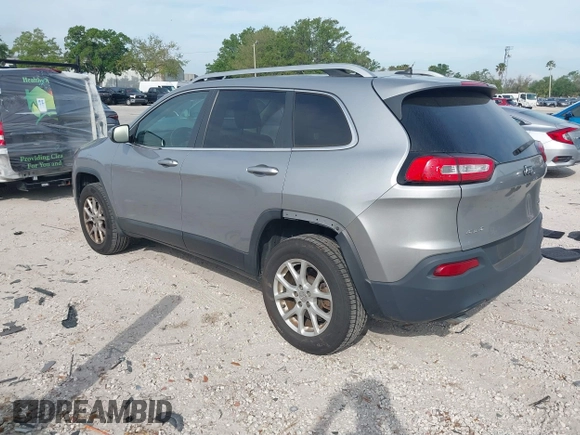 2014 Jeep Cherokee Altitude with VIN 1C4PJMCB4EW107556, listed as a IAAI auction lot 41881448 with 212,816 mi miles and . Bid and sale history available at DreamBid. Image 3.