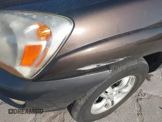 2005 Kia Sportage LX z VIN KNDJF723757132772, wystawiony jako IAAI lot #41436925 z przebiegiem 134 653 mil mil oraz . Historia ofert i sprzedaży dostępna na DreamBid. Obrazek 6.