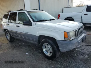 1997 Jeep Grand Cherokee TSi with VIN 1J4FX58S2VC612449, listed as a Copart auction lot 43532675 with 221,382 mi miles and Salvage Title. Bid and sale history available at carsss.com. Image 4.