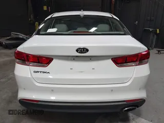 2018 Kia Optima LX z VIN 5XXGT4L34JG252028, wystawiony jako IAAI lot #41979909 z przebiegiem 90 113 mil mil oraz . Historia ofert i sprzedaży dostępna na DreamBid. Obrazek 17.