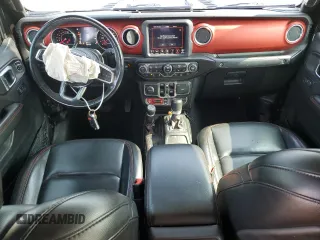 2020 Jeep Gladiator Rubicon with VIN 1C6JJTBG2LL166964, listed as a Copart auction lot 58041945 with 62,716 mi miles and Salvage title. Bid and sale history available at DreamBid. Image 8.