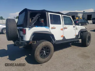 2014 Jeep Wrangler Unlimited Rubicon with VIN 1C4BJWFG4EL325544, listed as a Copart auction lot 61966025 with 149,162 mi miles and Salvage title. Bid and sale history available at DreamBid. Image 3.